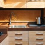 Modern kitchen on the 48 ft yacht, equipped for gourmet meal preparation, essential for Dubai boutique yacht charters