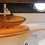 Chic and well-appointed bathroom in the yacht, enhancing the luxury experience of a boutique yacht charter in Dubai