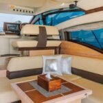 Elegant interior lounge of the yacht, offering a luxurious and comfortable space for guests during their Dubai yacht experience
