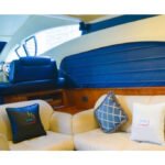 Lounge area inside the yacht, a luxurious space for relaxation on a Dubai Marina Luxury Yacht