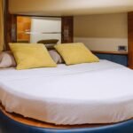 Comfortable double bed cabin in the motor yacht, ensuring restful moments during your yacht booking
