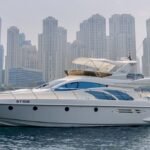 The motor yacht cruising in Dubai waters, epitomizing luxury on a yacht booking Dubai