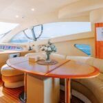 Indoor Dining Area in 55 Ft Yacht - Elegant Setting for Family Meals in Dubai