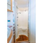 Bathroom in the yacht's cabin, adding convenience to your yacht rental Dubai per hour