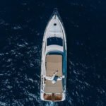 The yacht cruising in Dubai, epitomizing luxury and style for a yacht rental Dubai per hour