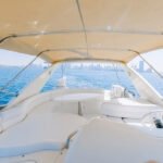 Upper deck of the 55 ft yacht, offering a prime spot for leisure during yacht rental Dubai per hour