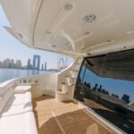 Relaxation area on the 55 ft yacht, perfect for guests enjoying yacht rental Dubai per hour
