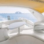 Outdoor dining space on the yacht, perfect for enjoying gourmet meals during a yacht in Dubai charter