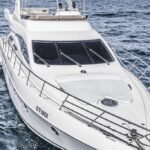 General exterior view of the 62 ft yacht, showcasing its elegance for a Private Yacht in Dubai for Family and Friends outing
