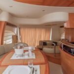 Elegant interior dining area on the Dubai yacht, enhancing the Private Yacht for Family and Friends experience