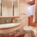 Stylish bathroom in the yacht's cabin, adding luxury to the Private Yacht for Family and Friends experience in Dubai