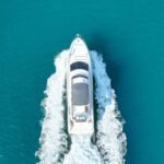 The yacht elegantly sailing in Dubai's waters for an exclusive boat cruise experience
