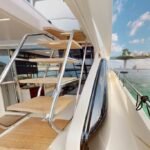 Deck of the 67 ft yacht, offering a prime spot for leisure and entertainment, reflecting the value of our Dubai boat cruise cost