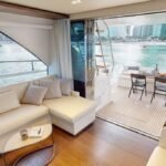 Lounge area inside the yacht, a luxurious space for relaxation during your luxury boat cruise Dubai