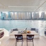 Dining area inside the yacht, enhancing the dining experience within the daily boat cruise Dubai