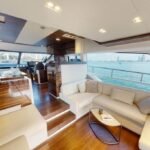 Lounge area inside the yacht, a luxurious space for relaxation during your luxury boat cruise Dubai