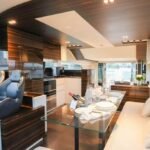 Dining area inside the yacht, enhancing the dining experience within the daily boat cruise Dubai