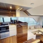 Dining area inside the yacht, enhancing the dining experience within the daily boat cruise Dubai