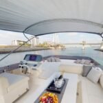 Lounge area inside the yacht, a luxurious space for relaxation during your luxury boat cruise Dubai