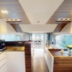 Lounge area inside the yacht, a luxurious space for relaxation during your luxury boat cruise Dubai