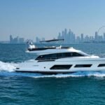 The yacht elegantly sailing in Dubai's waters for an exclusive boat cruise experience