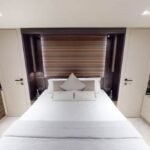 Double bed cabin in the yacht, offering a peaceful retreat, included in the Dubai boat cruise cost