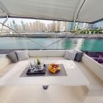 Lounge area inside the yacht, a luxurious space for relaxation during your luxury boat cruise Dubai