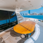 Spacious deck of the 68 ft yacht, ideal for socializing and enjoying Dubai's scenic views on a private yacht excursion