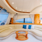 Comfortable lounge area inside the 68 ft luxury yacht, designed for relaxation during Dubai yacht charters