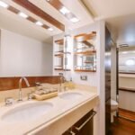 Bathroom in the yacht's cabin, adding convenience and value to your Dubai yacht hire