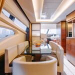 Dining area inside the yacht, enhancing the dining experience within the Dubai yacht hire deals
