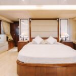 Comfortable double bed cabin in the yacht, offering a peaceful retreat, included in the Dubai yacht rental cost