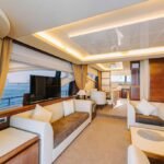 Lounge area inside the yacht, a luxurious space for relaxation, part of our competitive Dubai yacht rental cost