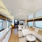78 ft Ultra Luxury Yacht 15 Guest 17 Elegant lounge area inside the yacht, reflecting the opulence offered by luxury yacht rental services Dubai for relaxation and socializing
