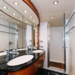 Bathroom in the yacht's cabin, adding convenience and comfort to your Dubai daily yacht rental