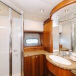 Bathroom in the yacht's cabin, adding convenience and comfort to your Dubai daily yacht rental